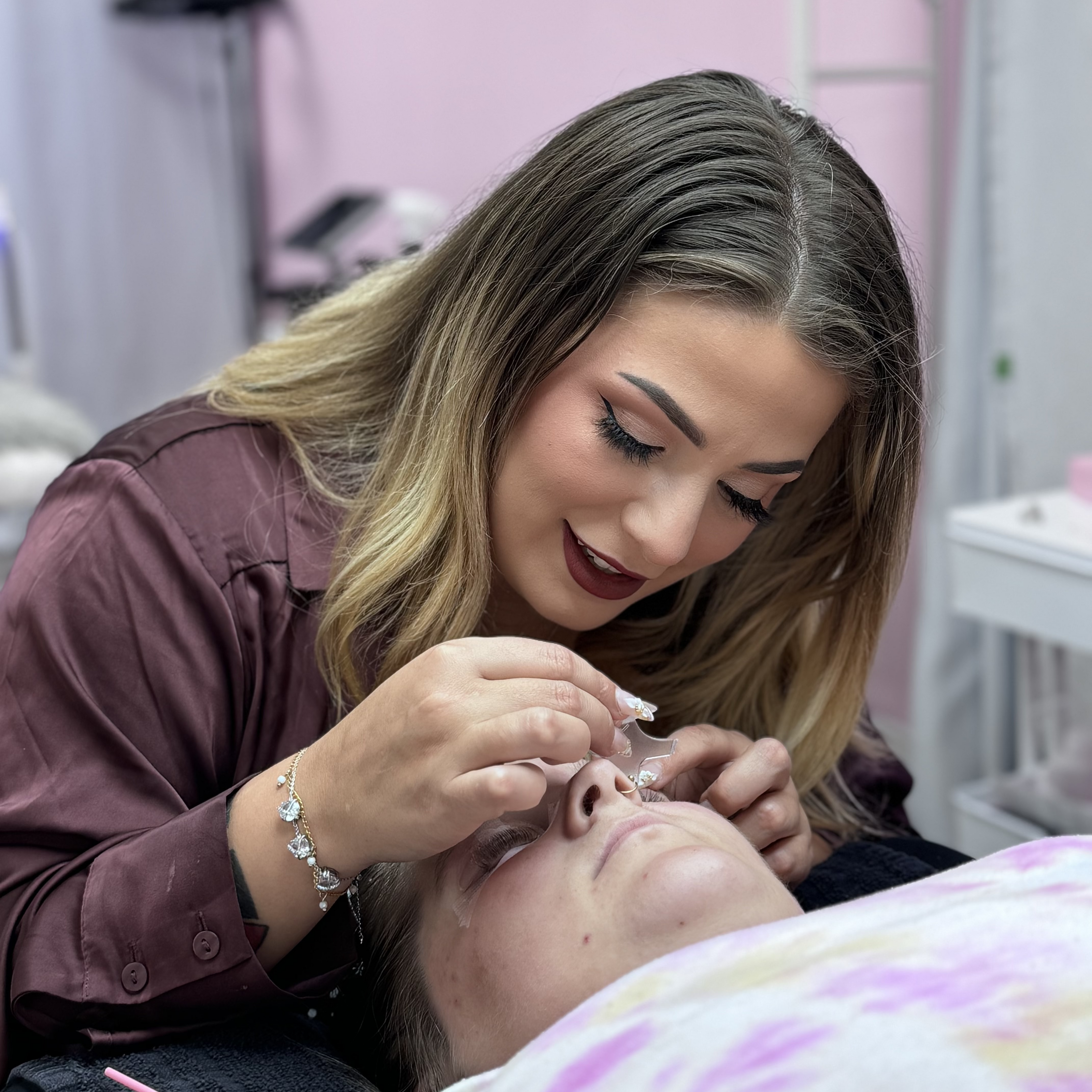Student practicing lash lift and tints