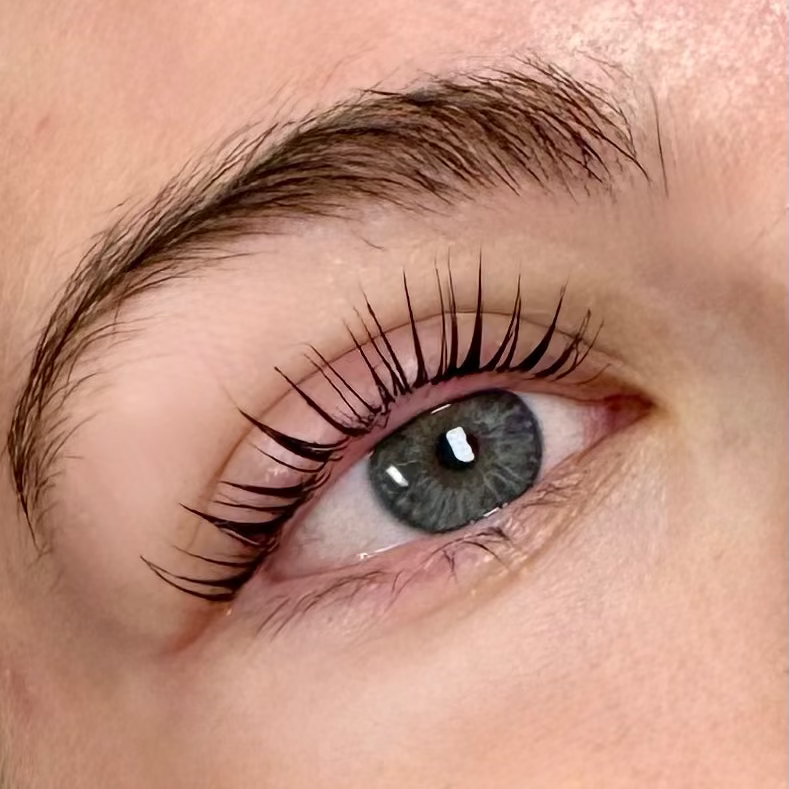 Close-up of a person's eye with lash lift.